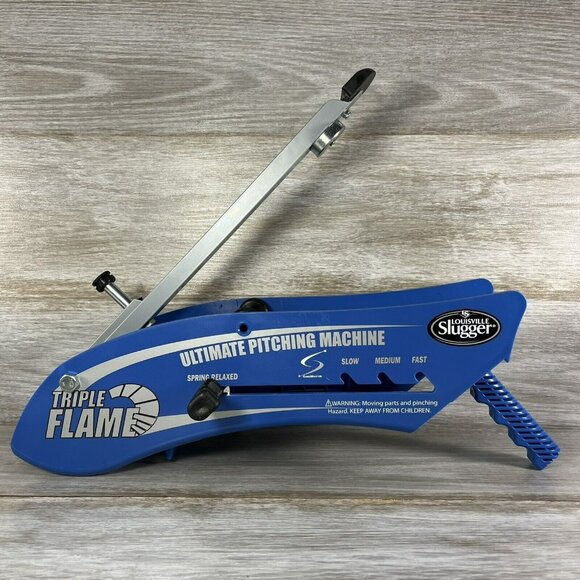 Louisville Slugger Triple Flame Hand-Held Ultimate Pitching Machine - Picture 1 of 6